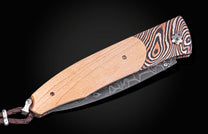 William Henry knife with wood from Yankee Stadium, Mokume Gane frame, and damascus blade