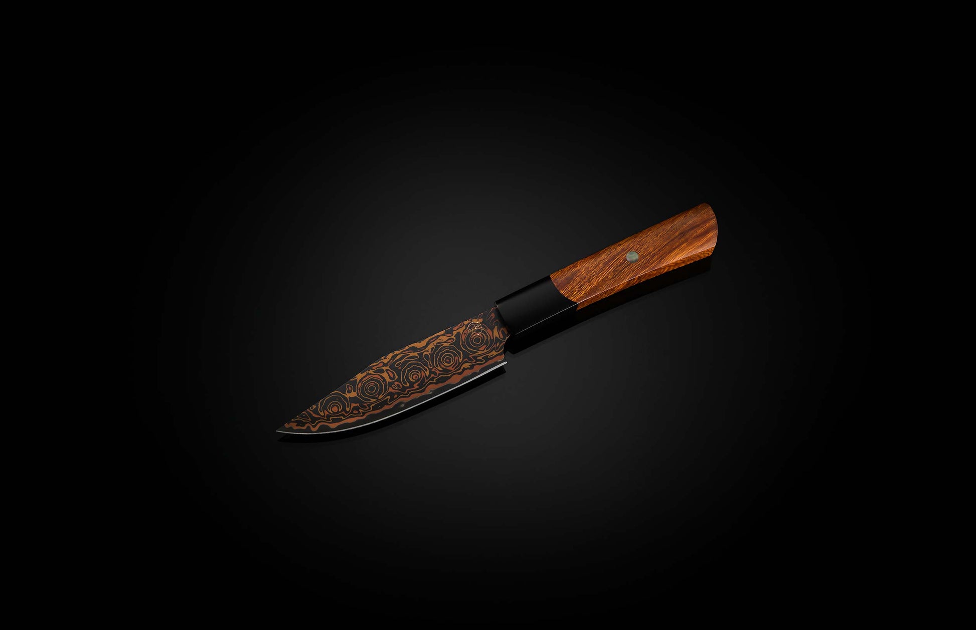  steak knife on black background