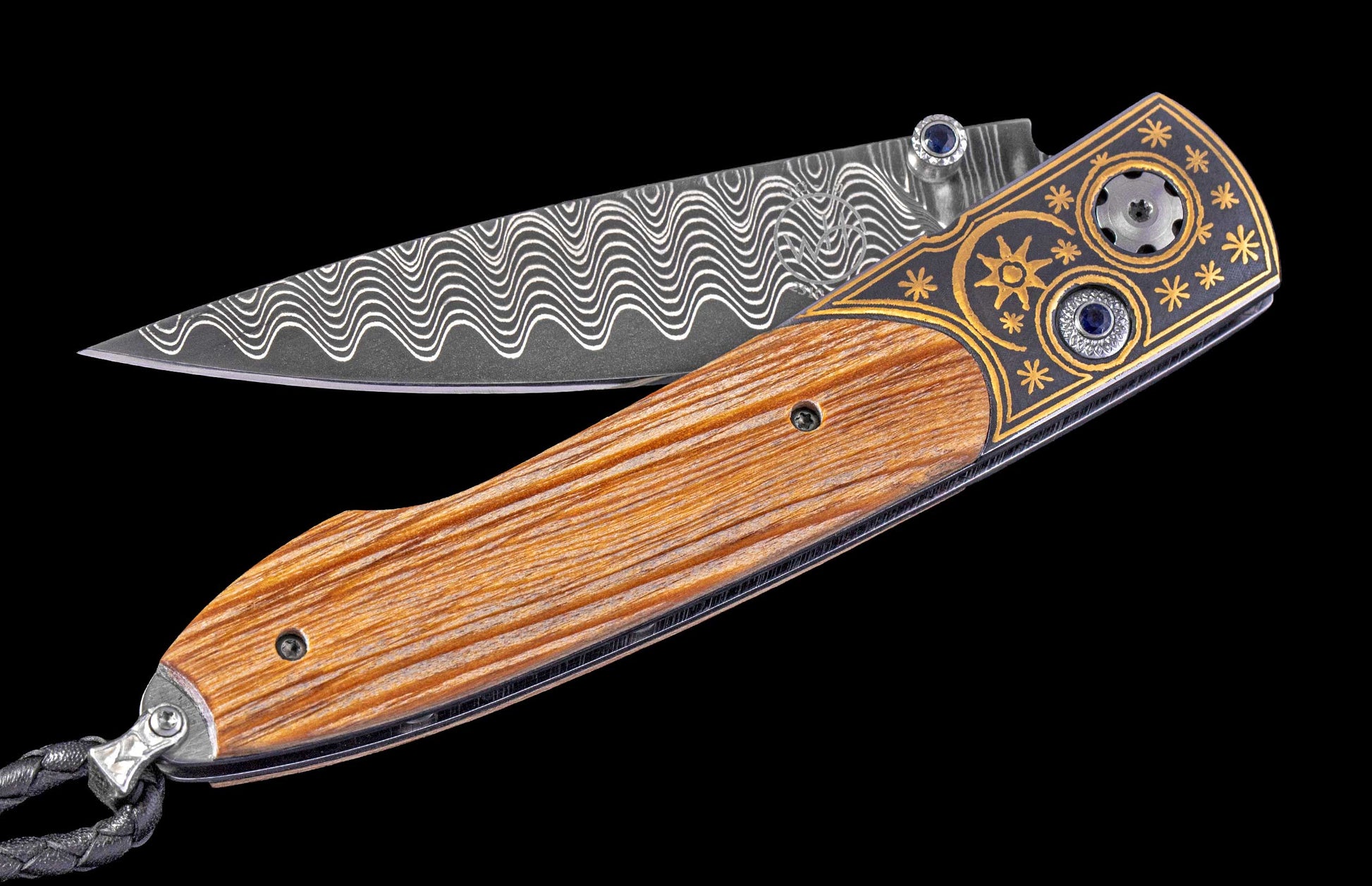 Folding knife with wooden handle and decorative blade on a black background