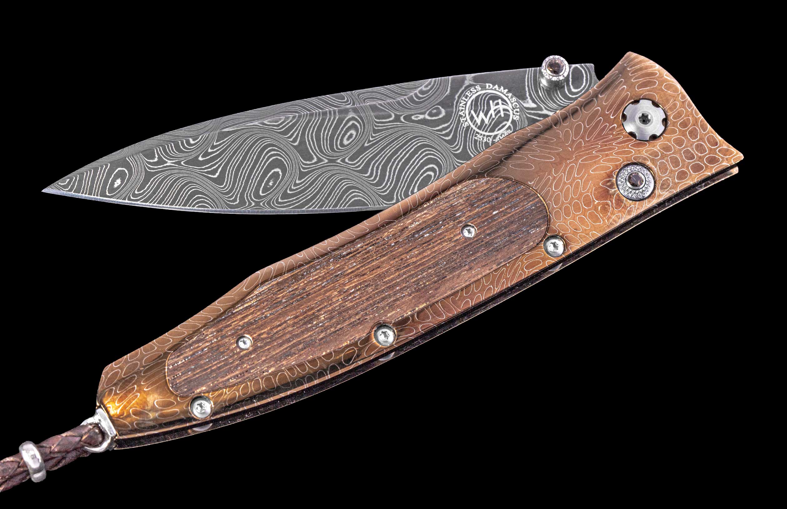 Folding knife with Damascus blade and wooden handle on a black background