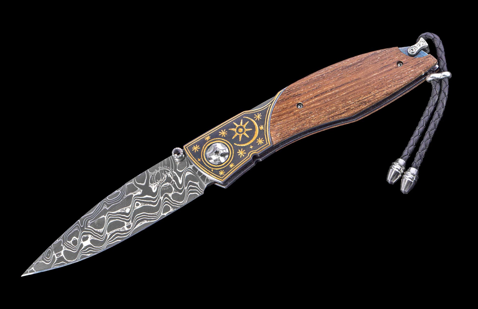Decorative folding knife with wooden handle and metal blade on a black background
