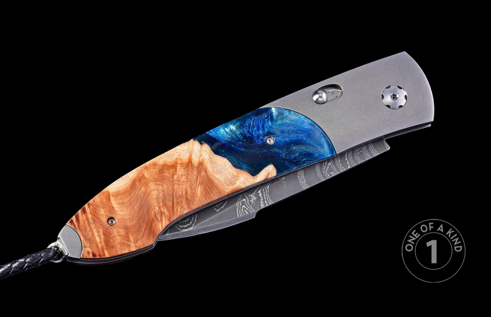 closed pocket knife with wood and resin handle on a black background