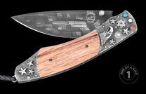 Damascus steel folding knife with wood handle, engraved eagle and stars, gem accents, by WH, one-of-a-kind design, side view