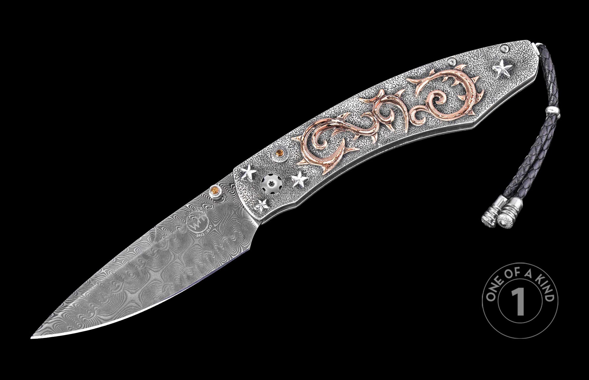 Damascus steel knife with textured silver handle, rose gold scrollwork, star inlays, and braided cord, one of a kind, side view