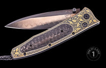 Damascus steel folding knife with black carbon fiber handle, gold floral inlay, and braided lanyard, one of a kind, side view