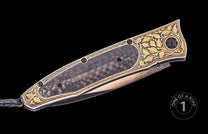 Luxury folding knife with carbon fiber inlay and gold leaf floral engraving, side view, one of a kind