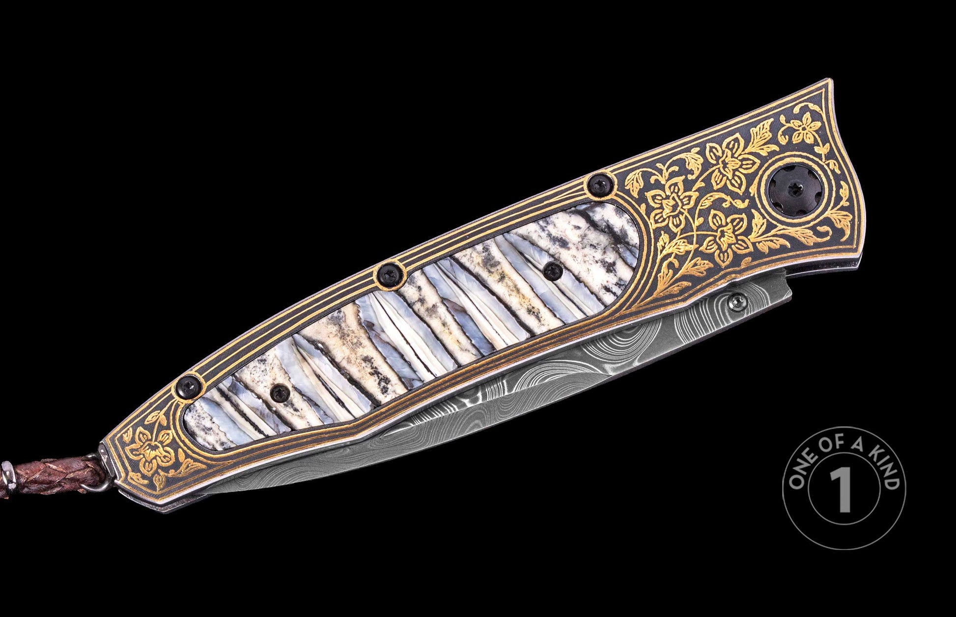 Luxury folding knife with damascus steel blade and mother-of-pearl inlay, featuring gold floral engraving and black frame, side view, one of a kind