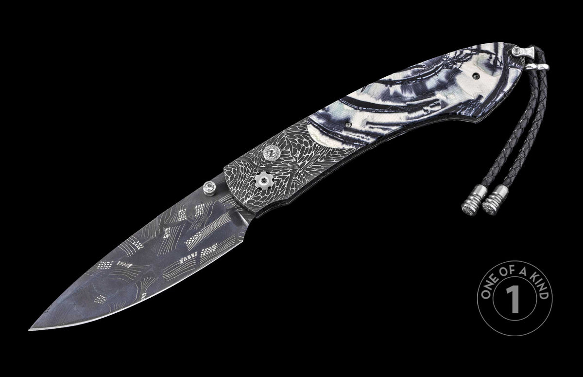 Damascus steel knife with intricate blade pattern and marbled black-white handle, featuring textured bolster and braided lanyard, one-of-a-kind luxury design