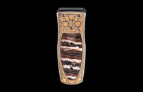 Luxury money clip with intricate gold floral engraving and banded agate inlay, front view