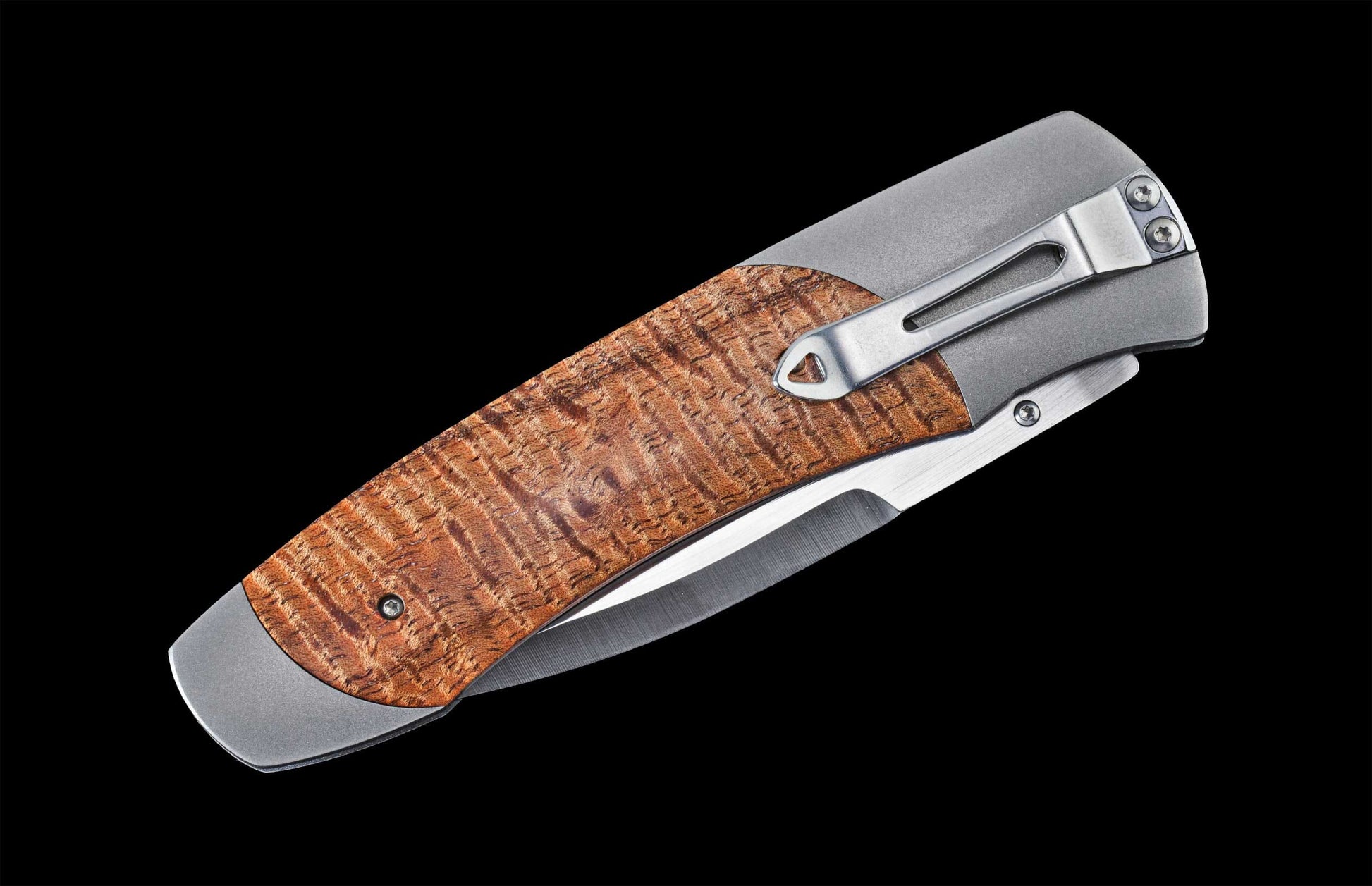  inlaid with curly koa wood and a CPM 20CV blade