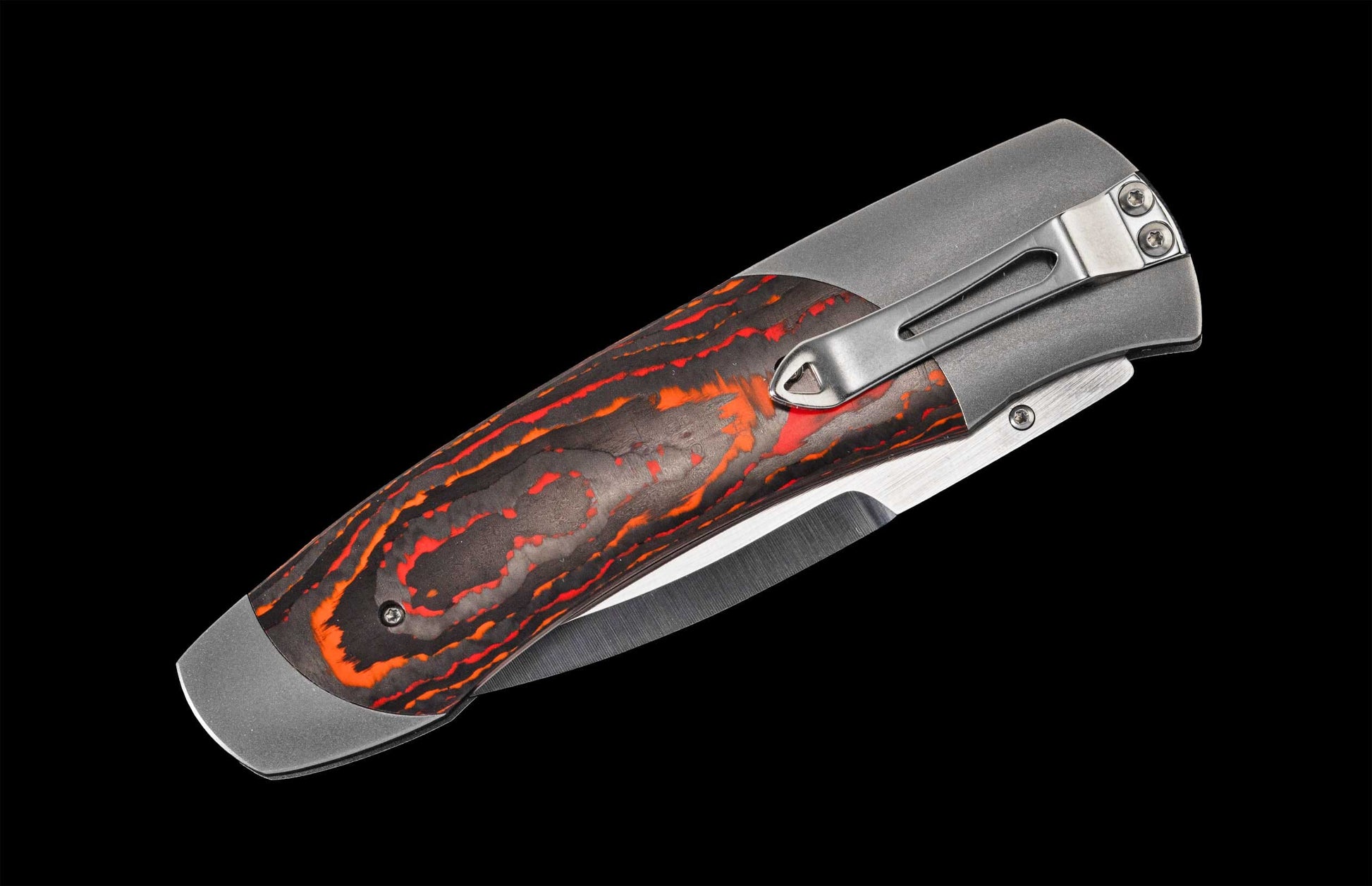 Handcrafted William Henry pocket knife with hand-finished titanium frame inlaid with 'Mars Valley' carbon fiber and a S35VN blade