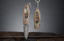 A Knife Pendant with Mokume Gane, Black Lip Pearl, and Damascus Blade