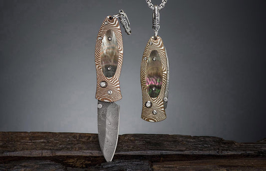 A Knife Pendant with Mokume Gane, Black Lip Pearl, and Damascus Blade