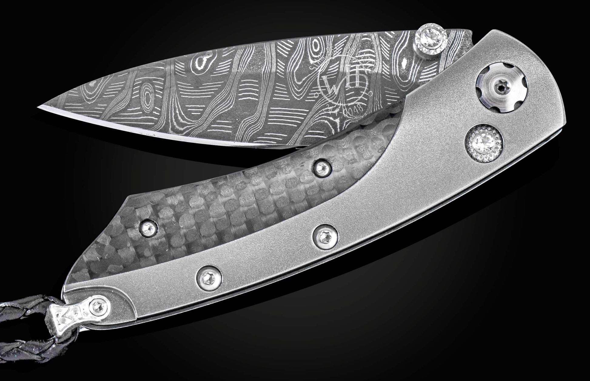 The folding titanium pocket knife with carbon fiber and Damascus steel