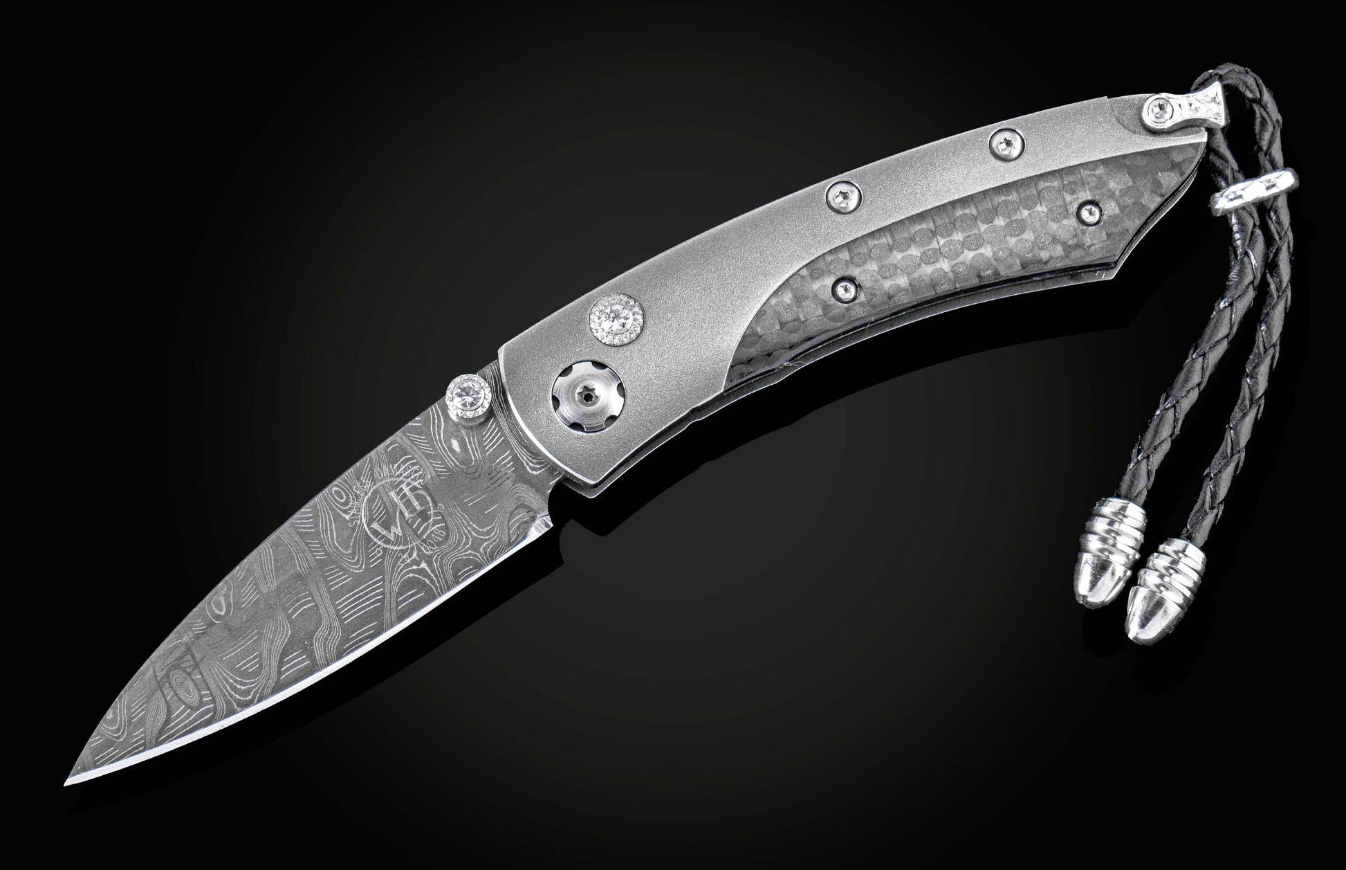 The folding titanium pocket knife with carbon fiber and Damascus steel