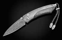 The folding titanium pocket knife with carbon fiber and Damascus steel
