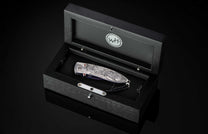 The Monarch America Hand-engraved Pocketknife with Hand-Forged 'Flag' Damascus Blade in a case