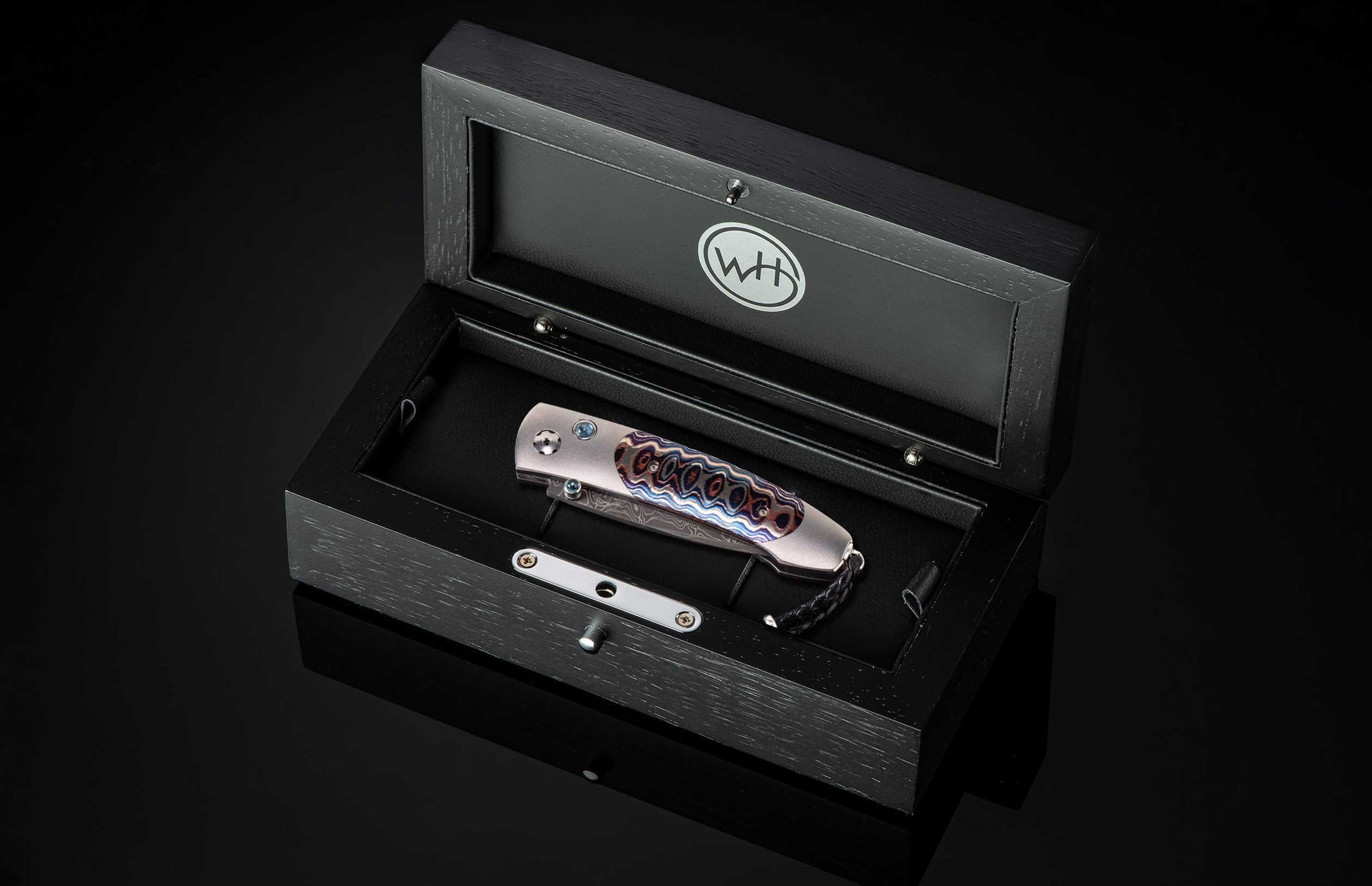 The Dark Fire Titanium Pocketknife with 'Wave' Mokume and Damascus Blade in a case