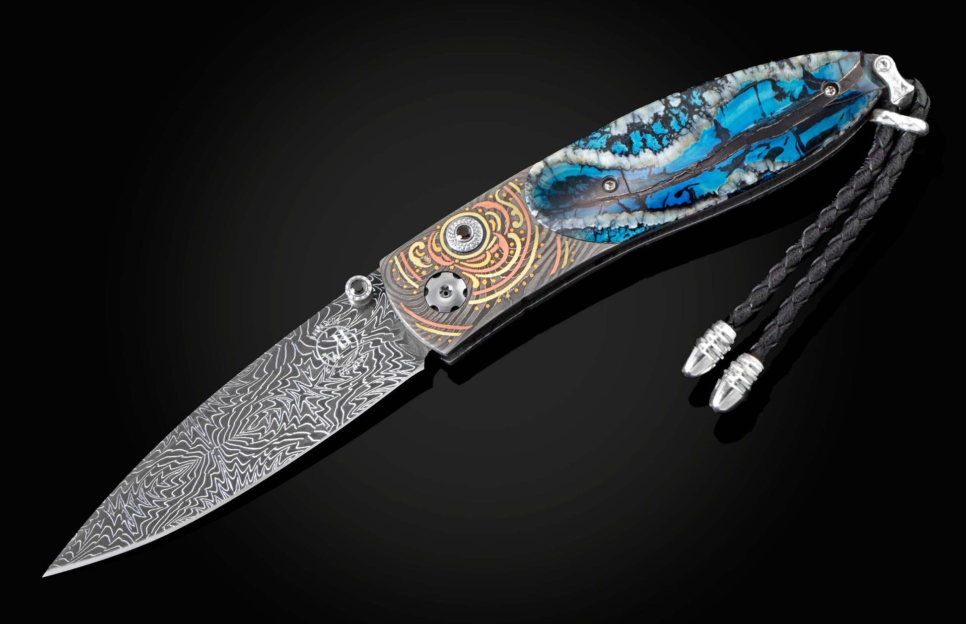 Handcrafted pocket knife from William Henry features a hand-forged Damascus frame with fine inlays of 24K & 22K yellow gold