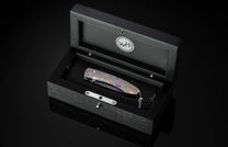  set with smoky quartz gemstones and a Damascus steel blade.