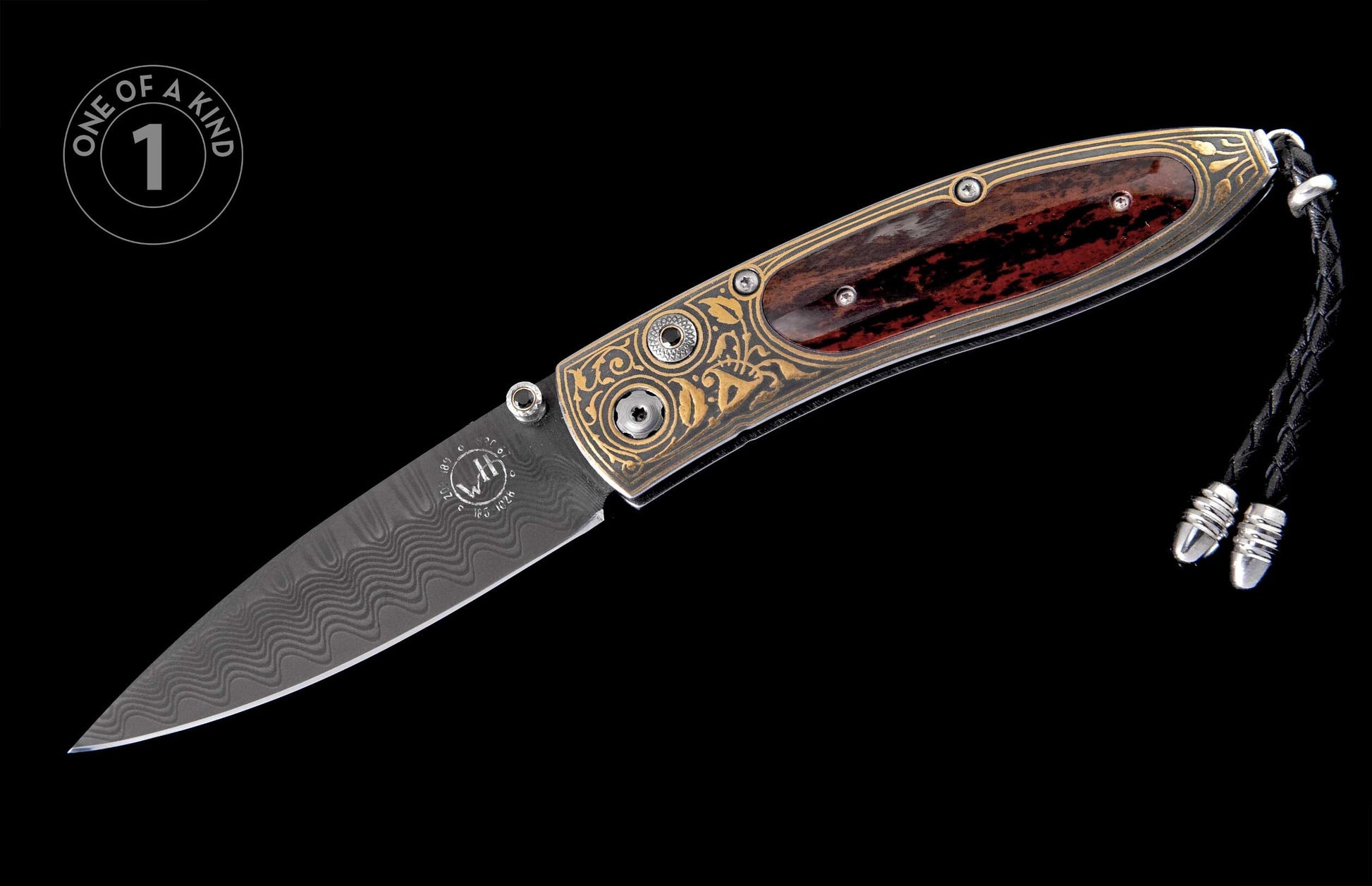 A decorative folding knife with a wavy Damascus steel blade featuring a 'WH' logo, a dark red wood handle with ornate gold engraving, and a braided leather lanyard.