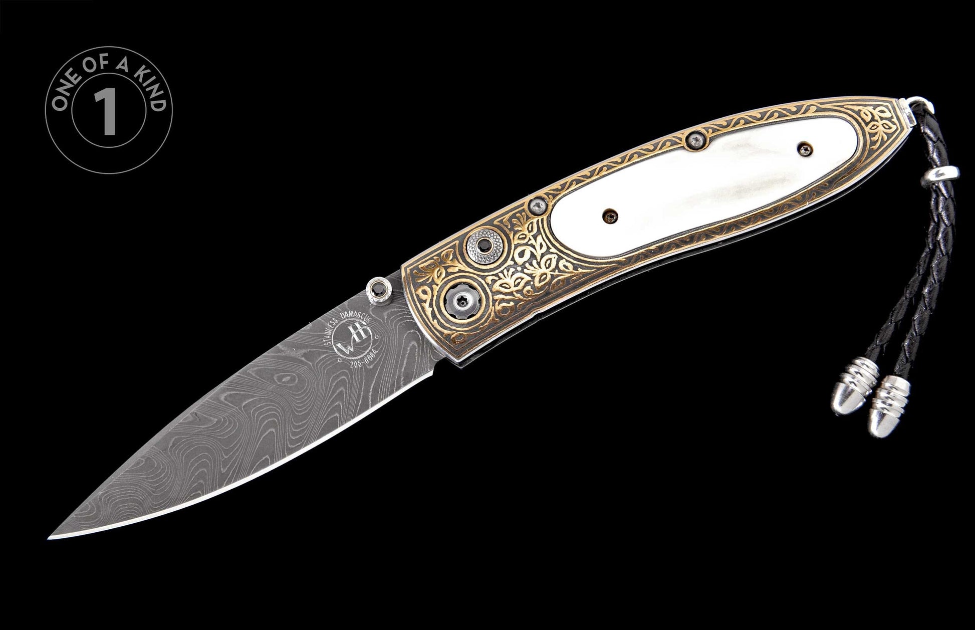Ornate folding knife with a Damascus blade and white handle inlay, featuring gold-toned engraved bolsters and a black leather lanyard.