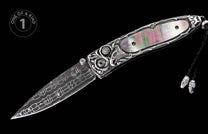 Ornate silver folding knife with a Damascus blade, iridescent mother-of-pearl handle, wolf carving, blue gemstones, and a braided black cord.