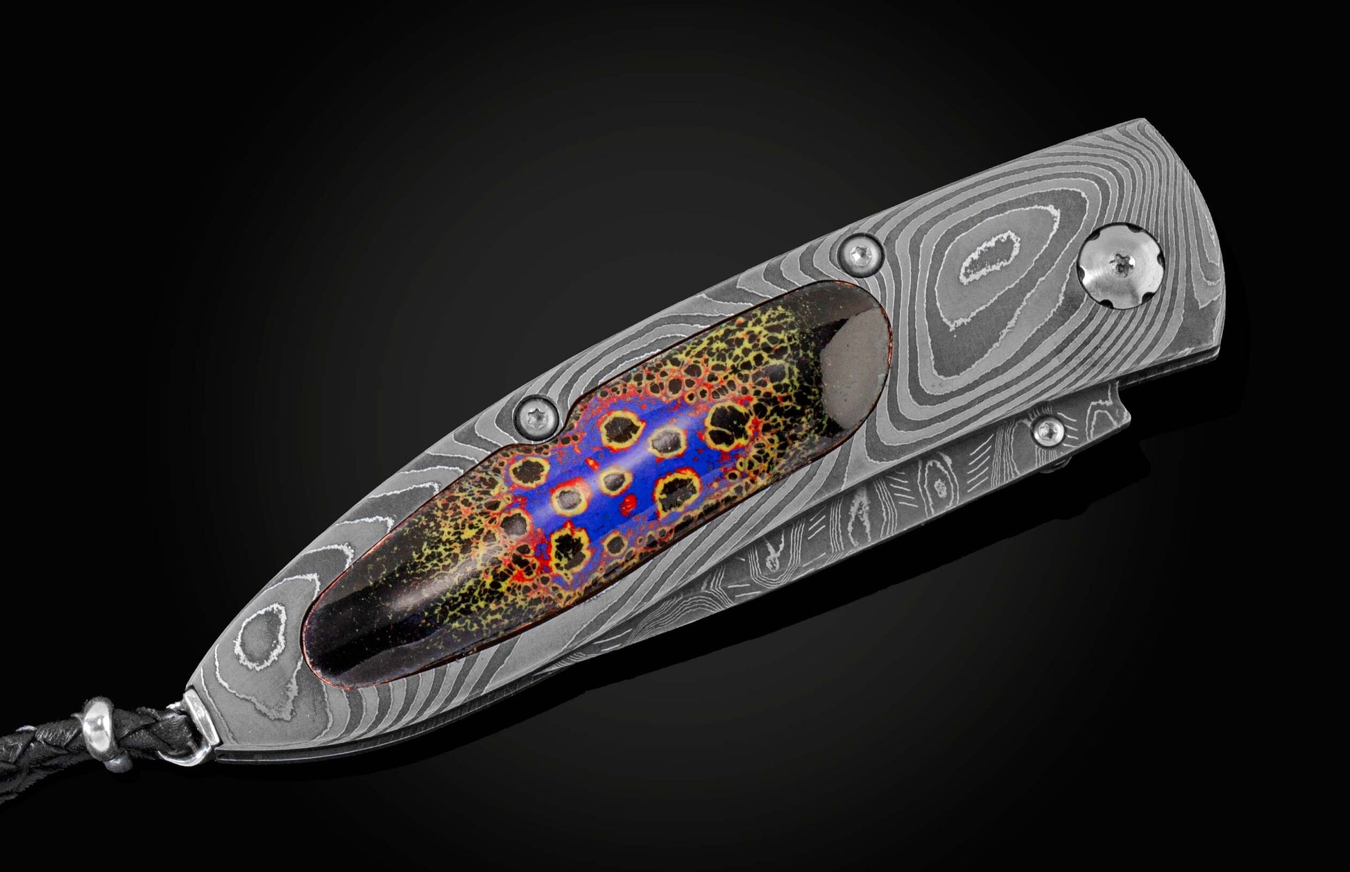 Handcrafted pocket knife from William Henry features a frame in hand-forged Damascus steel
