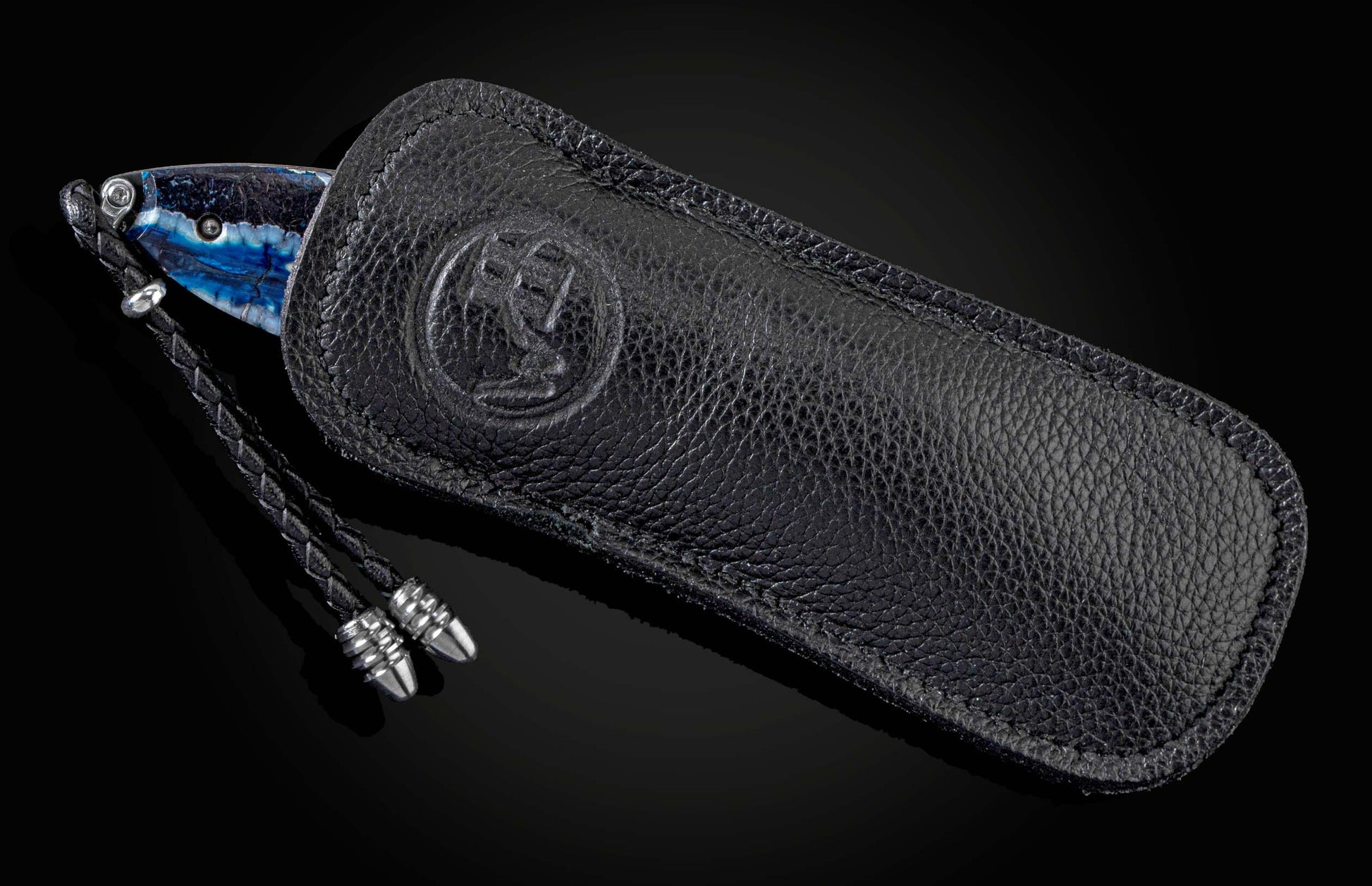 Handcrafted knife from William Henry featuring a hand-forged frame by Chad Nichols