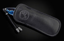 Handcrafted knife from William Henry featuring a hand-forged frame by Chad Nichols