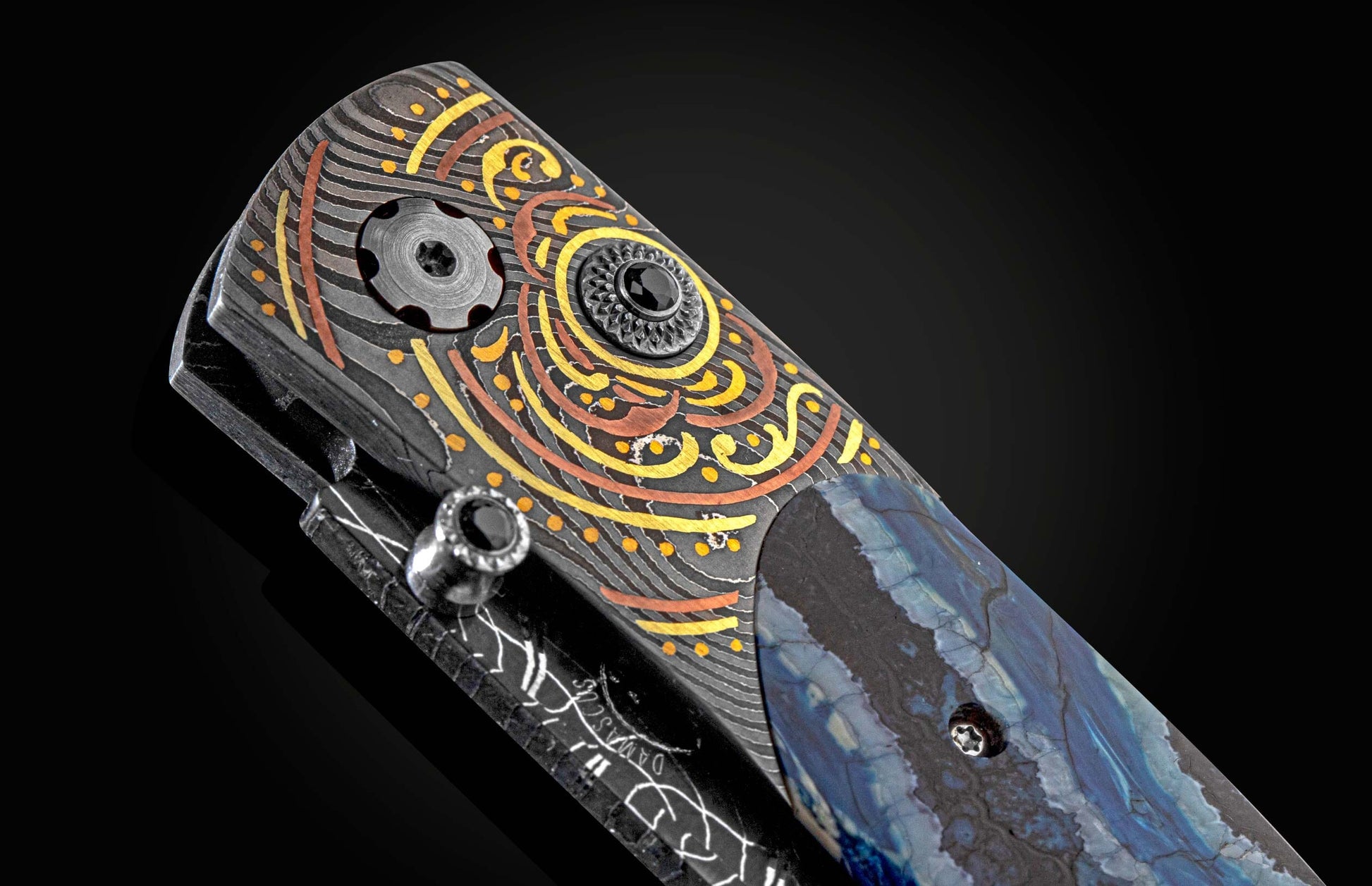  and a hand-forged Damascus steel blade by Larry Donnelly