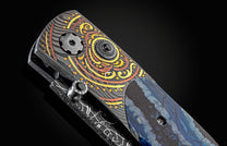 and a hand-forged Damascus steel blade by Larry Donnelly