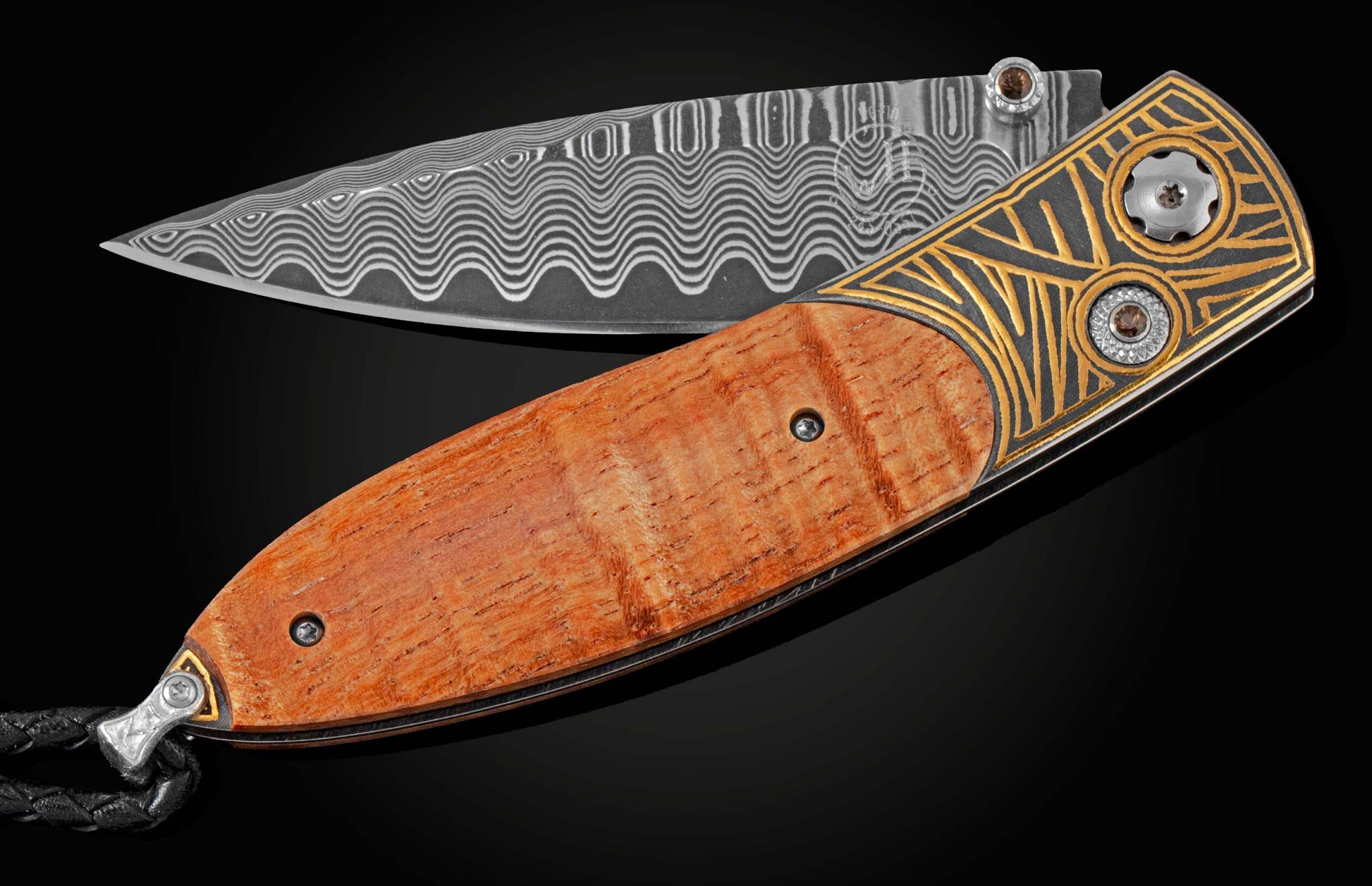 Handcrafted pocket knife with Damascus steel blade and scales featuring curly koa wood and 24K gold koftgari. Displayed on a black background partially open.