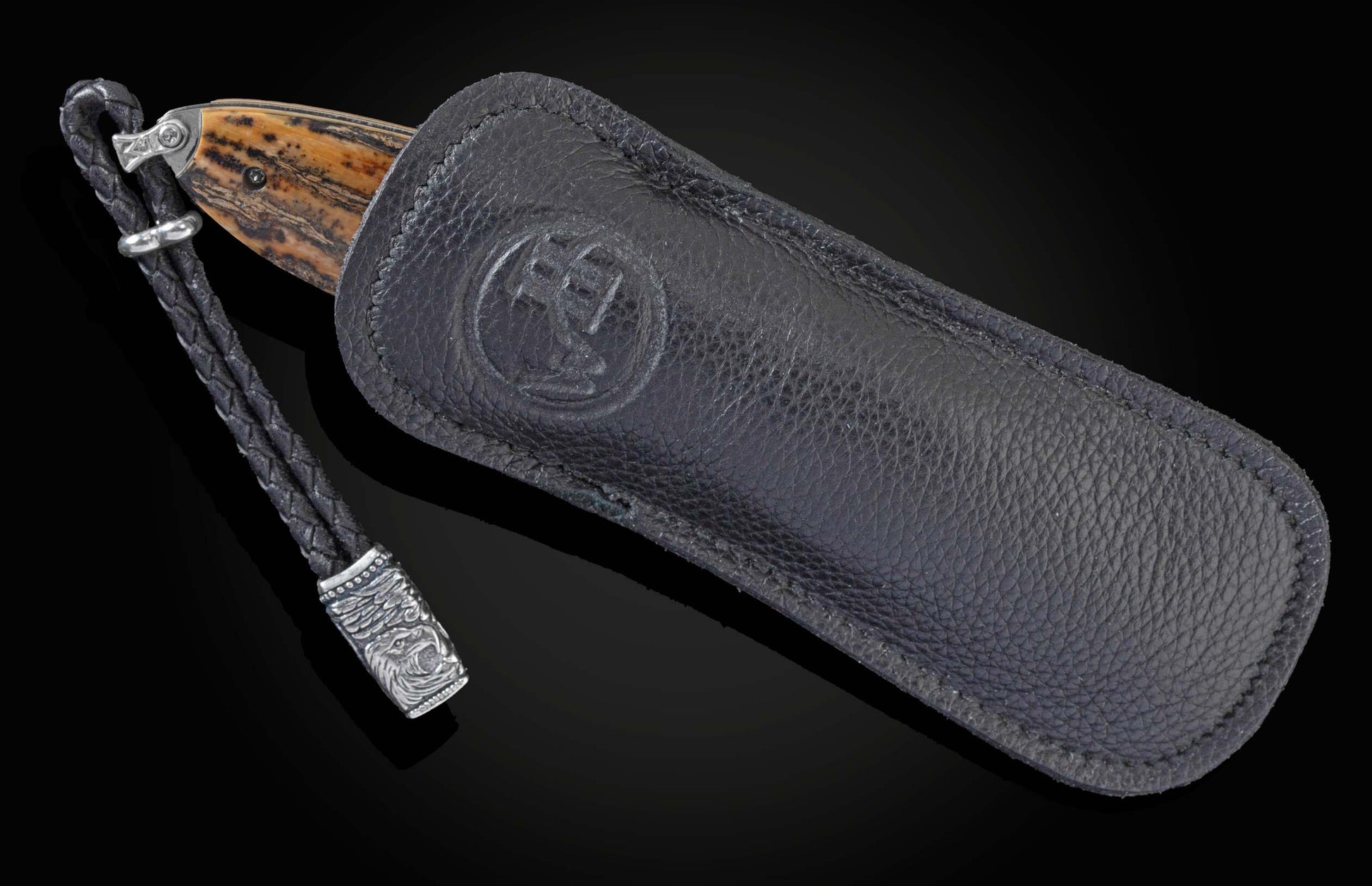 Handcrafted William Henry knife with a hand-carved sterling silver frame depicting an eagle head by Lee Downey