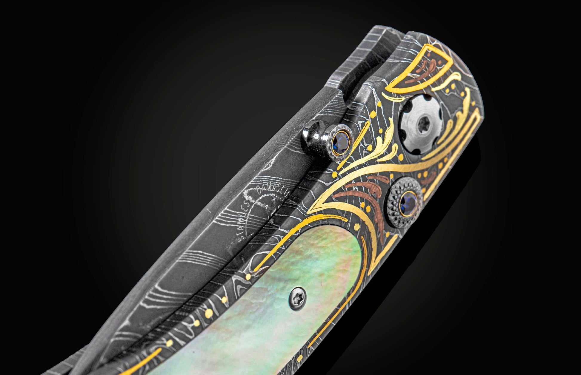 Handcrafted William Henry knife with hand-forged damascus steel frame and blade by Chad Nichols
