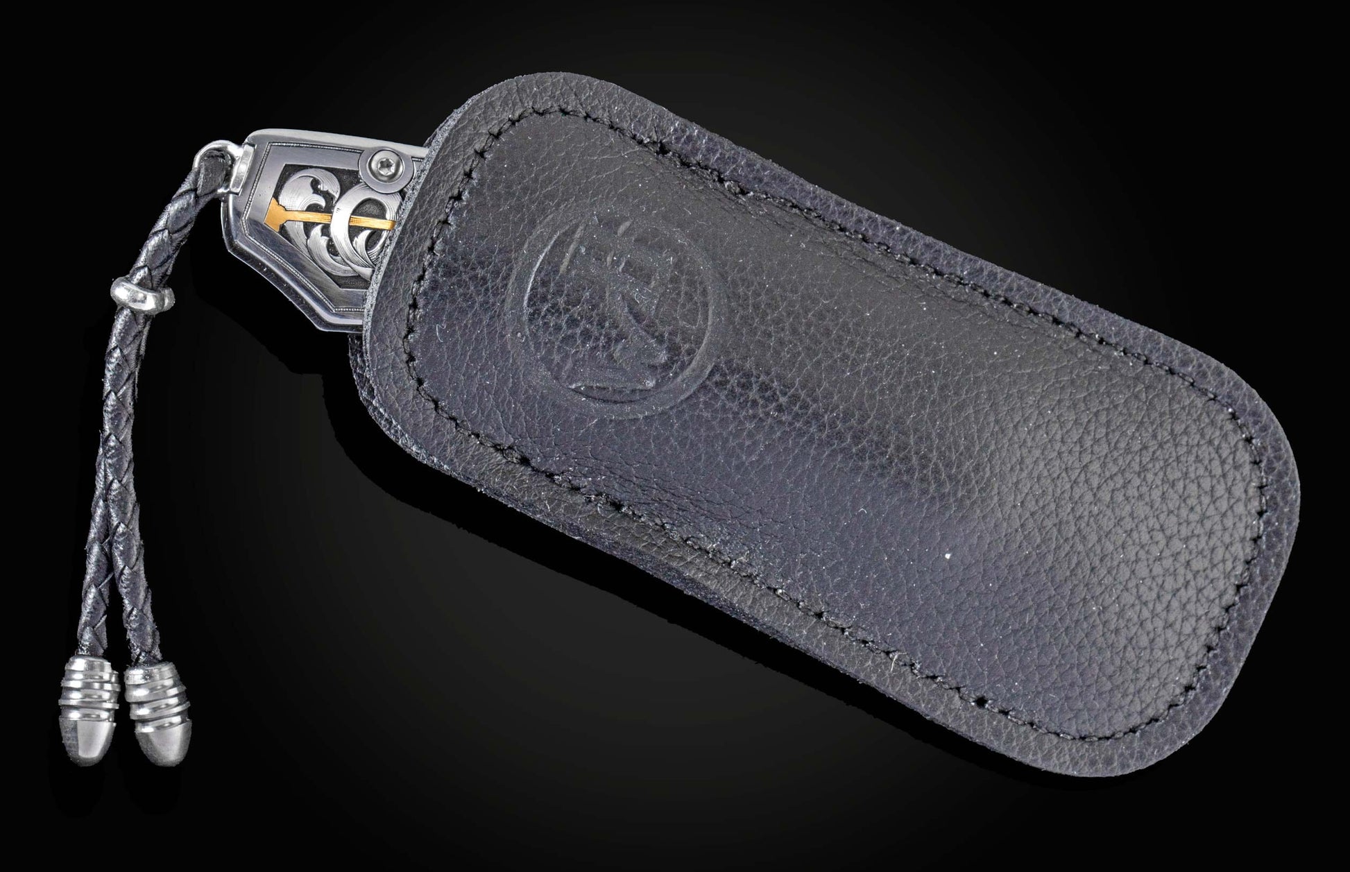 Handcrafted William Henry knife with hand-engraved stainless handles