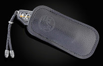 Handcrafted William Henry knife with hand-engraved stainless handles