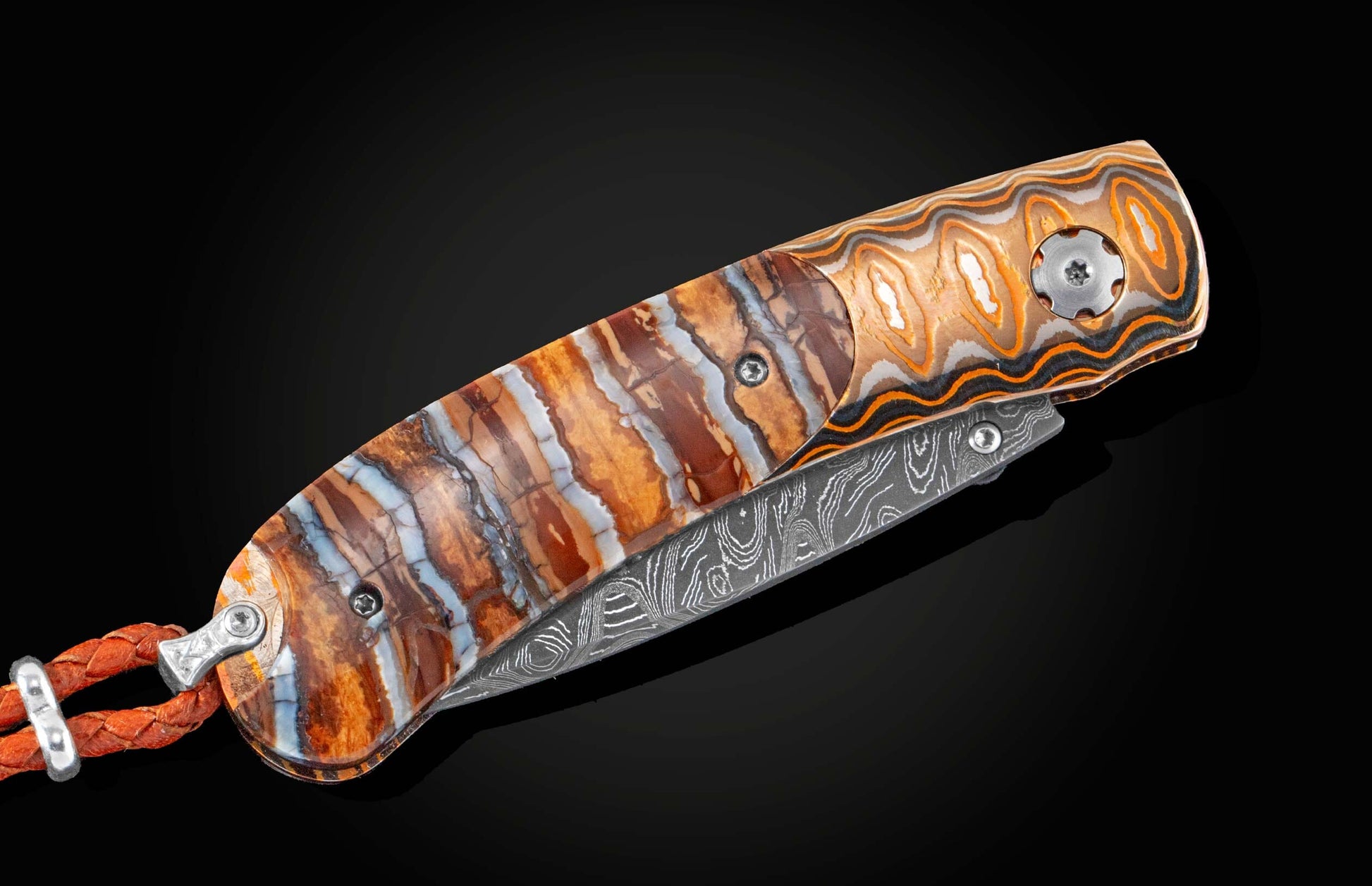 Handcrafted William Henry knife with Wave Mokume frame inlaid with fossil Woolly Mammoth tooth