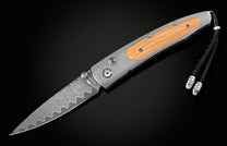  and a hand forged Damascus steel blade.