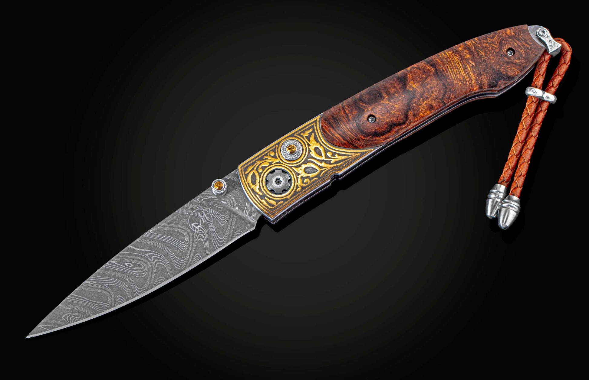  and a hand-forged Damascus Steel blade by Chad Nichols