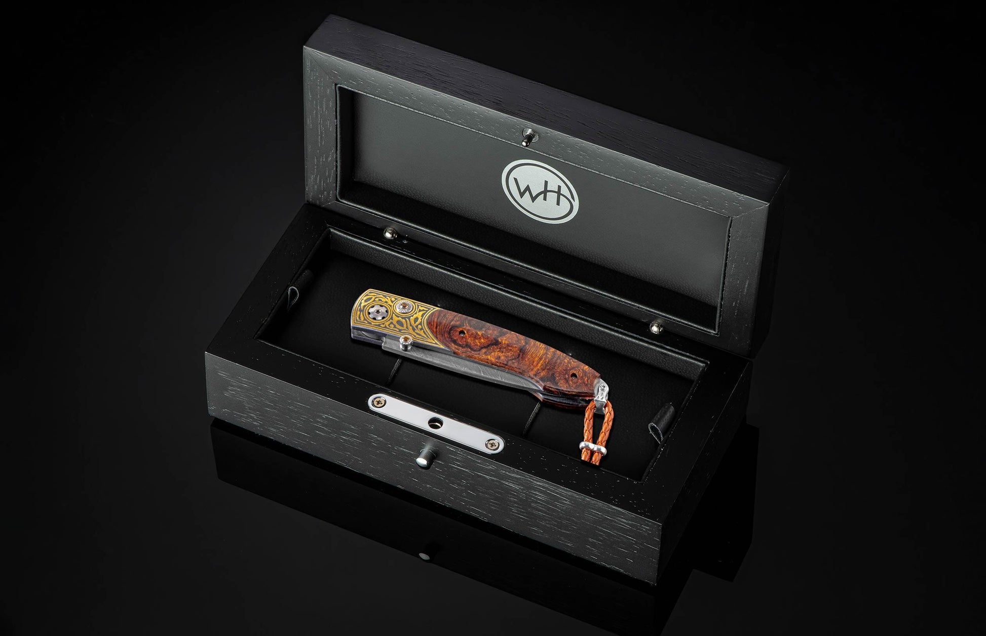  and a hand-forged Damascus Steel blade by Chad Nichols