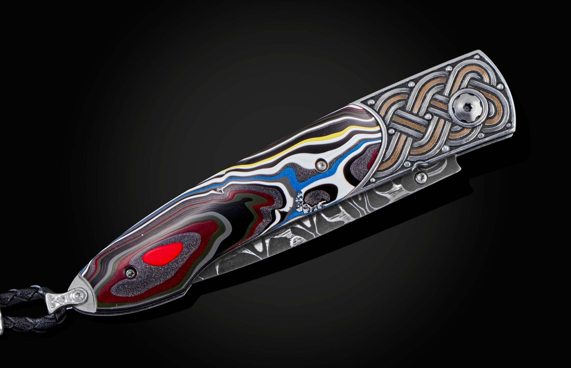 Handcrafted pocketknife from William Henry features a heat-colored