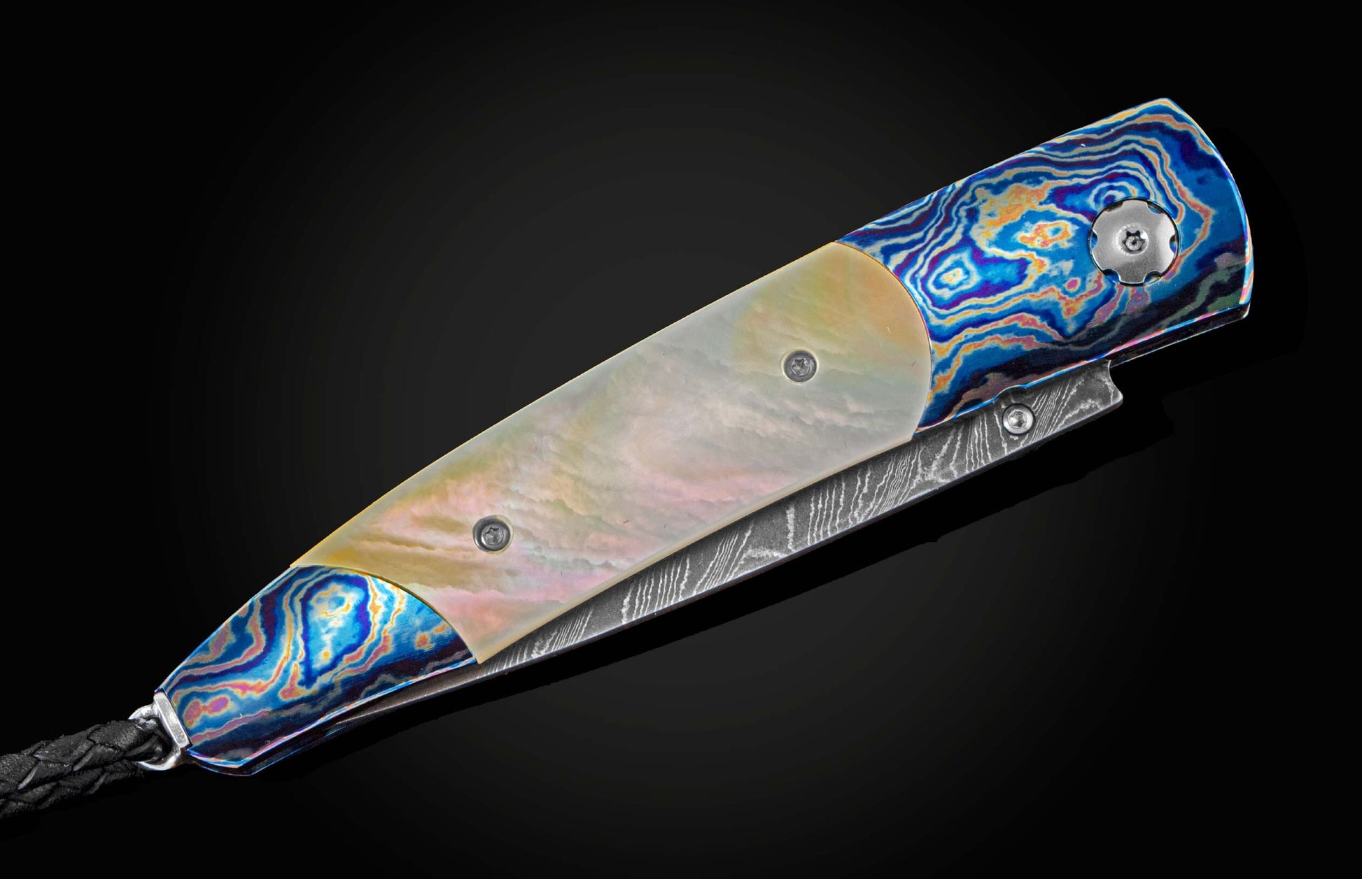  inlaid with Gold Lip Pearl scales. The knife is shown partially open on a black background.