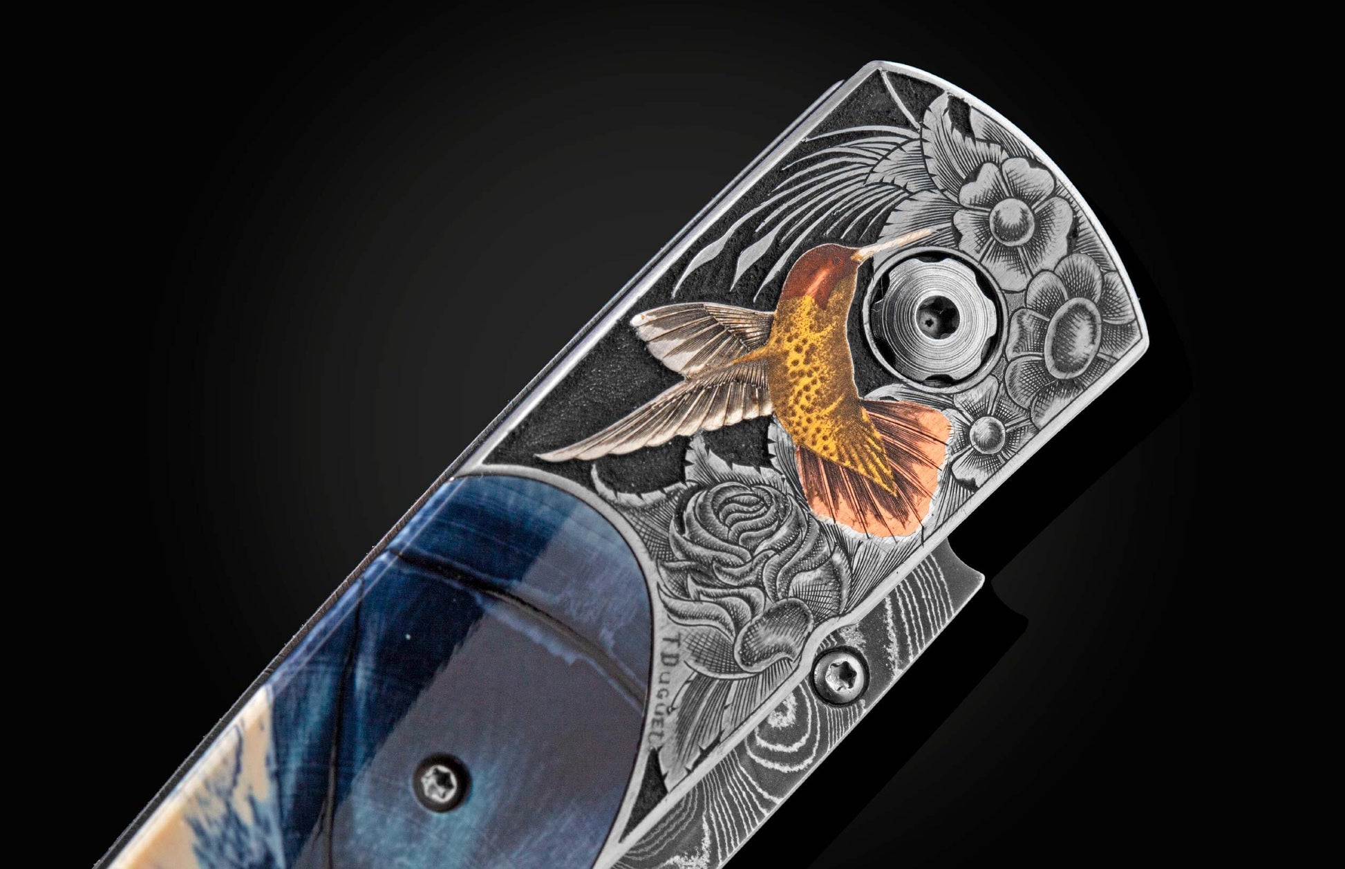  spinel gemstones and a hand-forged damascus steel blade by Chad Nichols