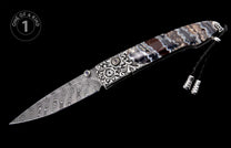 One-of-a-kind folding knife with a Damascus blade, ornate agate handle, intricate silver detailing, and blue gemstone accents.