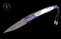 Custom folding knife with a swirling Damascus steel blade, vibrant purple and blue handle with mother-of-pearl inlay, and black leather lanyard.