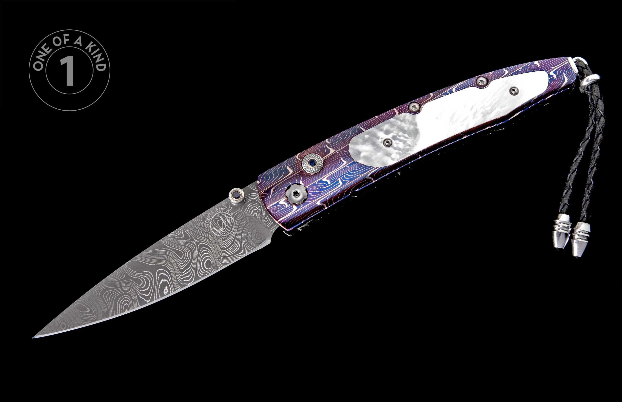 Custom folding knife with a swirling Damascus steel blade, vibrant purple and blue handle with mother-of-pearl inlay, and black leather lanyard.