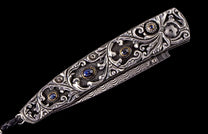 The Radiant Hand-Carved Sterling Silver Pocketknife