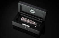 The Radiant Hand-Carved Sterling Silver Pocketknife in a case