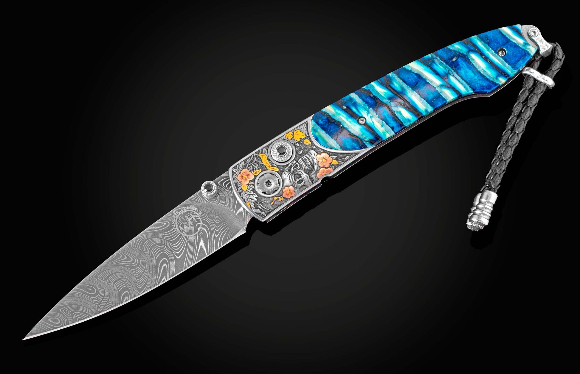  spinel gemstones and a hand forged damascus steel blade by Chad Nichols